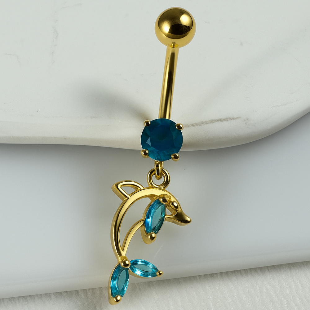 Close-up of 925 Silver Heart Belly Ring featuring gold-plated dolphin charm with aqua CZ stones. Premium sterling silver body jewelry for a chic look.