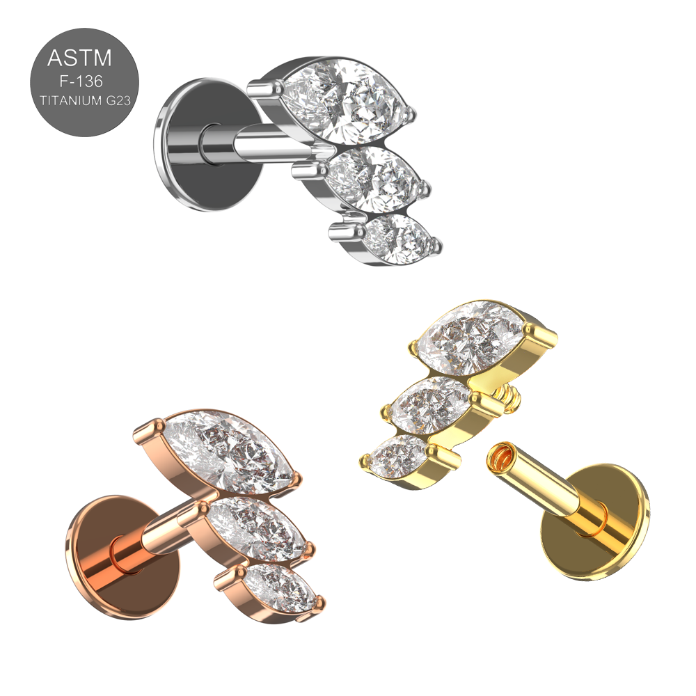 Three color variations of G23 Titanium Triple Marquise CZ Flat Back Studs in silver, gold, and rose gold for versatile piercing styles.
