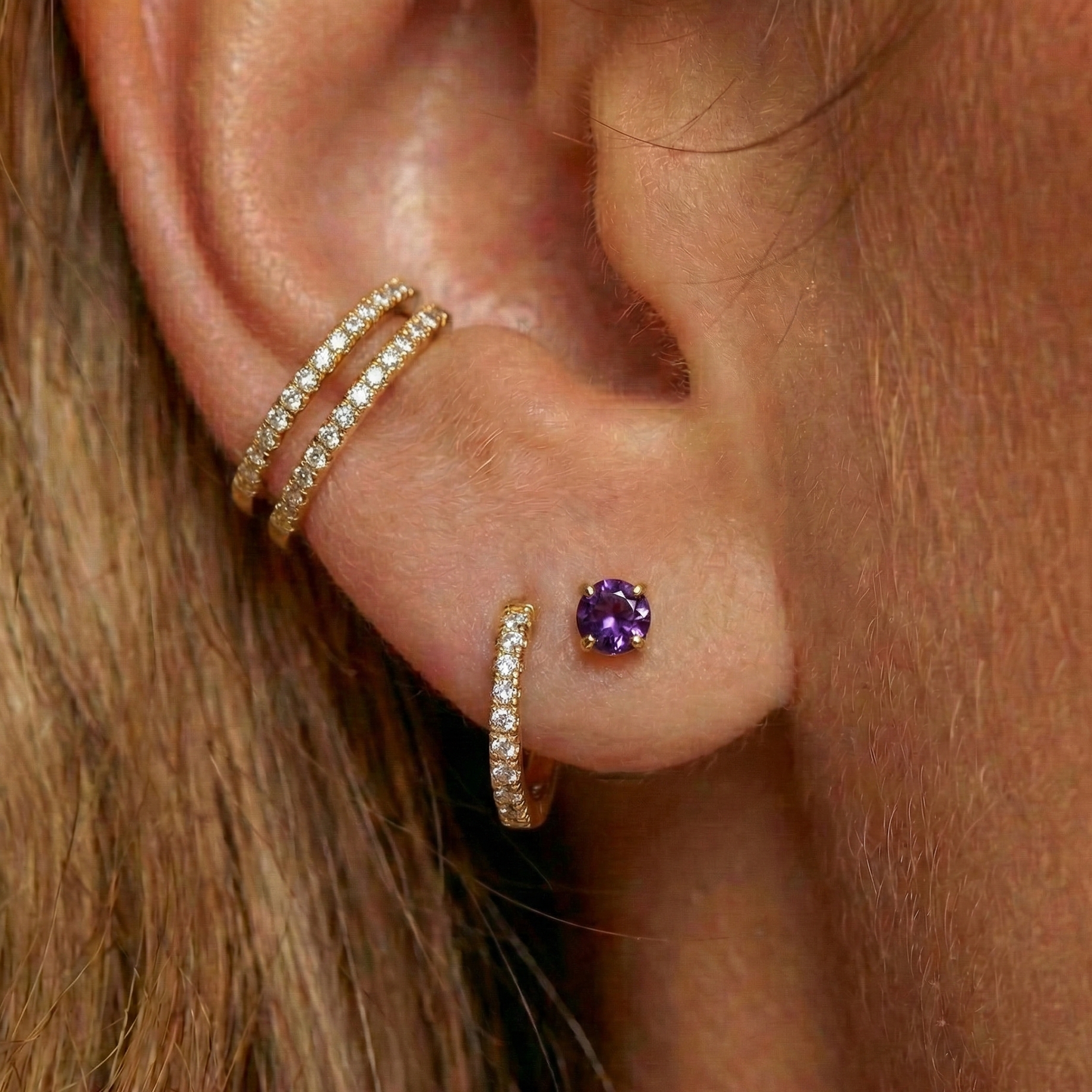 Minimal 14K Gold Amethyst Natural Stone Flatback Stud styled on the ear lobe with gold and diamond hoops, ideal for helix or tragus piercings.