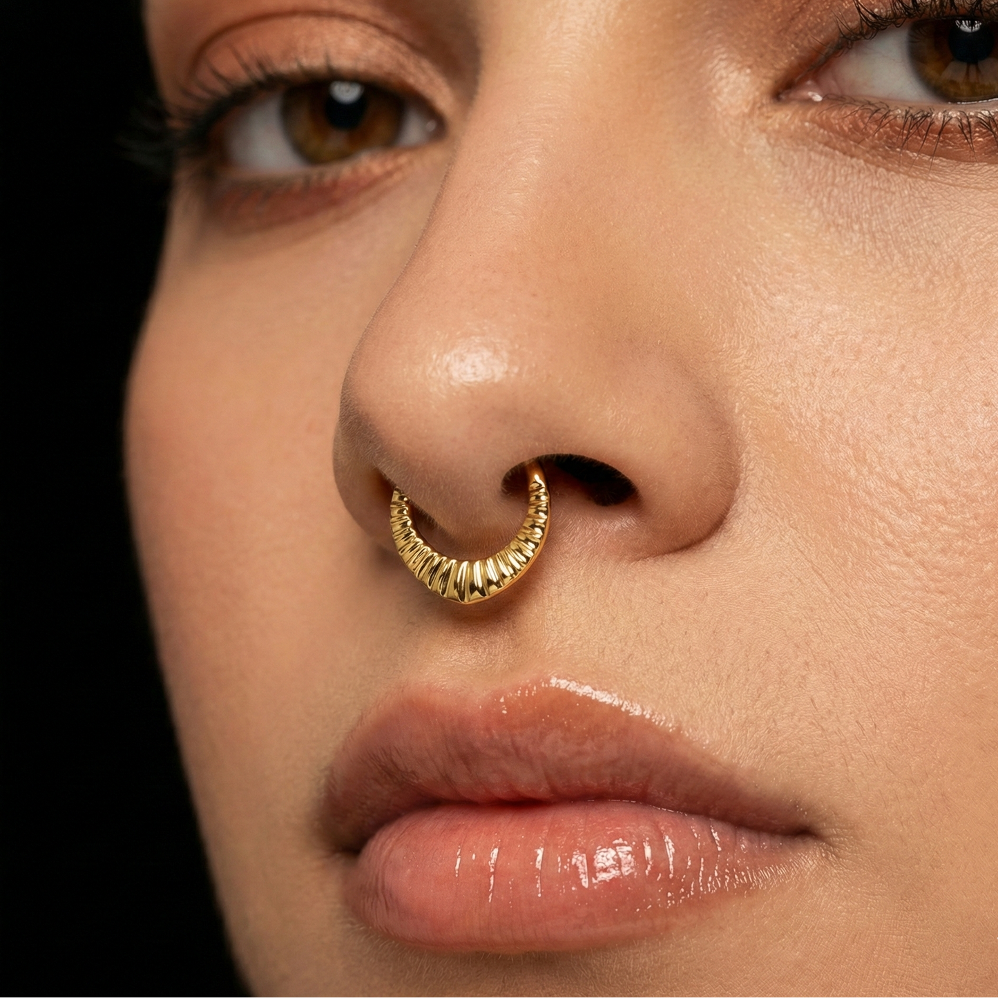 Model wearing G23 Titanium Carved Teardrop Clicker