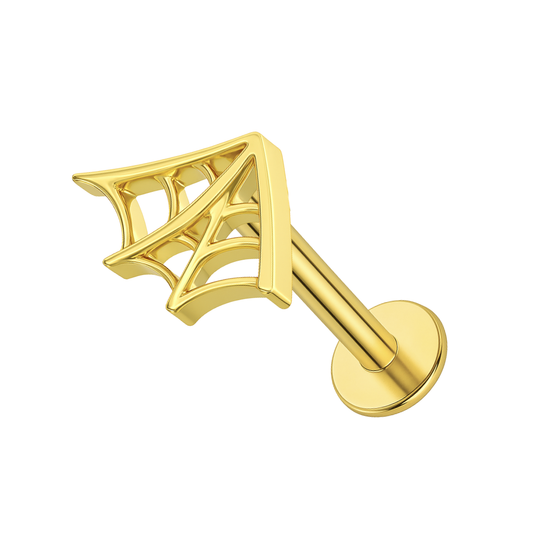 Gold G23 titanium spider web flatback stud for cartilage or tragus piercings. Hypoallergenic push-fit design with a sleek Halloween aesthetic.